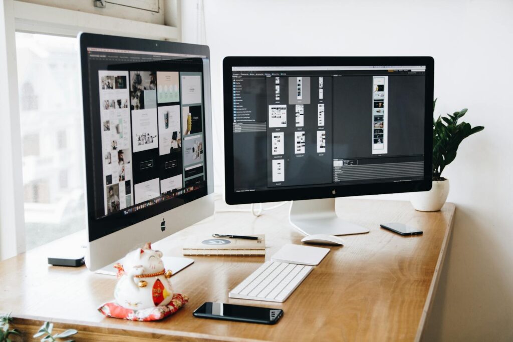 The Ultimate Guide on How to Check Website Ranking Effectively 6 A well-organized design workspace with dual monitors and design software on display.
