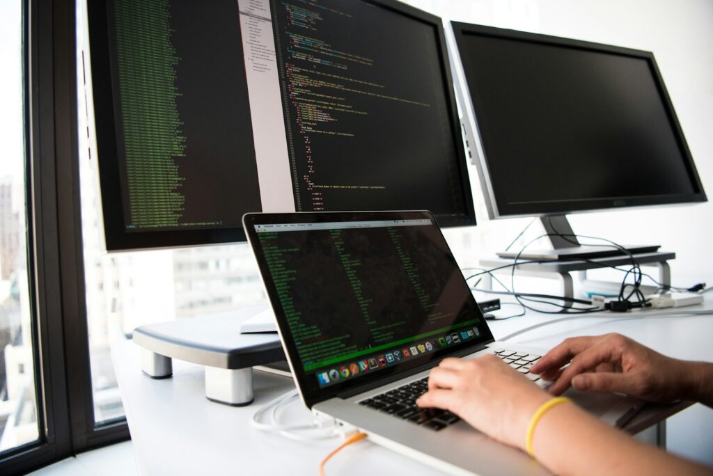 Best Web Hosting for Small Business and Why Kinsta is the Top Choice 1 shallow focus photo of person using MacBook