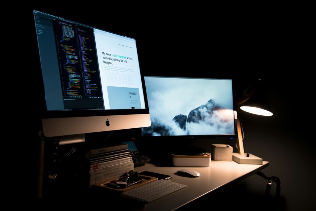 Mastering Ecommerce Website Development: A Practical Guide for Success 2 silver iMac turned on inside room