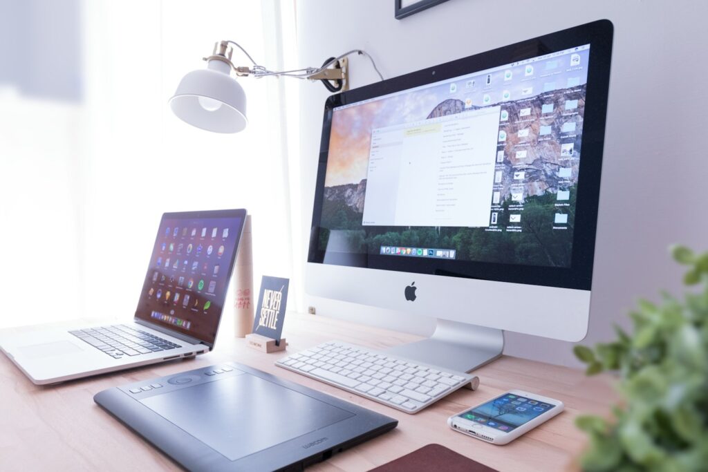 43 Creative Website Ideas to Inspire Your Next Project in 2025 10 silver iMac near iPhone on brown wooden table
