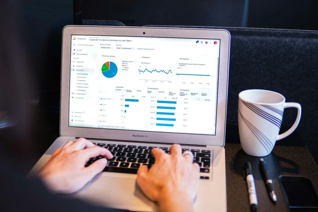 The Power of SEO Services for Small Business Success | Priceless Consulting Can Be Your Digital Marketing Solutions 6 person using macbook pro on black table