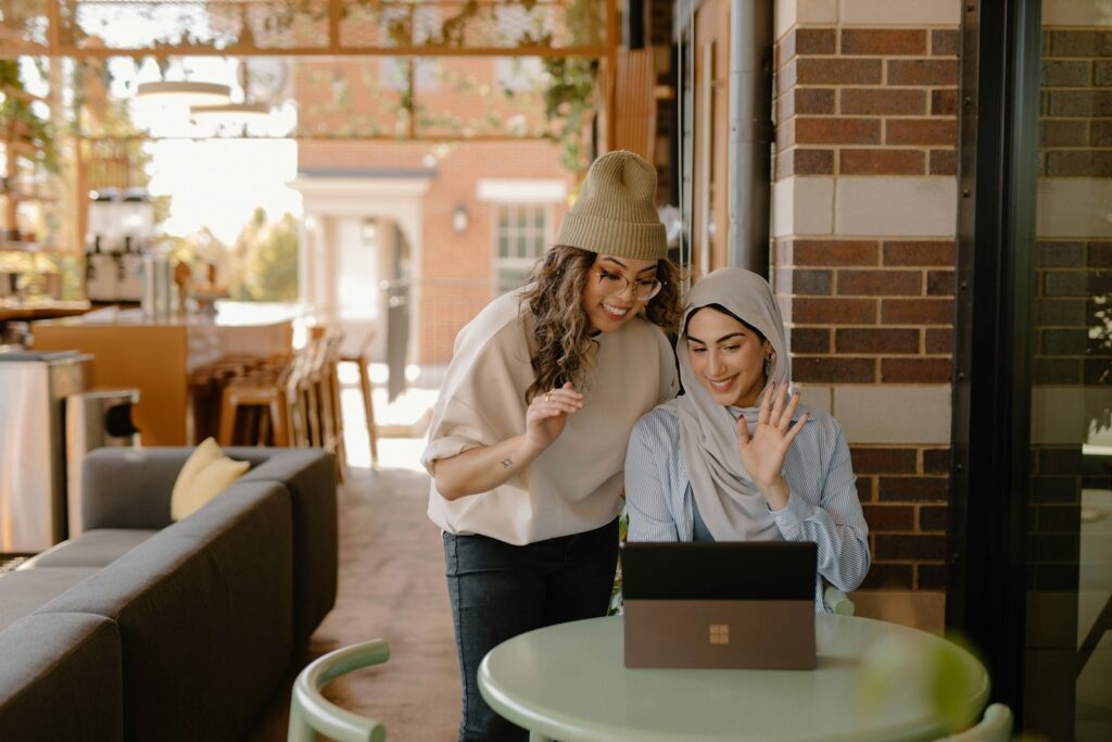The Essential Dummies Guide to Starting Your Own Business 2 a woman sitting at a table using a laptop