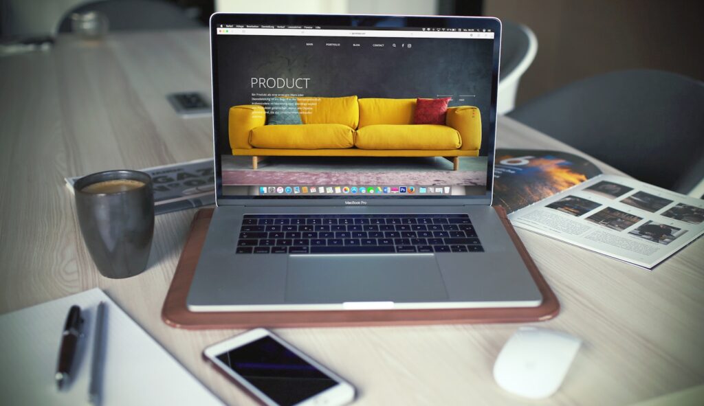 43 Creative Website Ideas to Inspire Your Next Project in 2025 7 turned on MacBook Pro beside gray mug