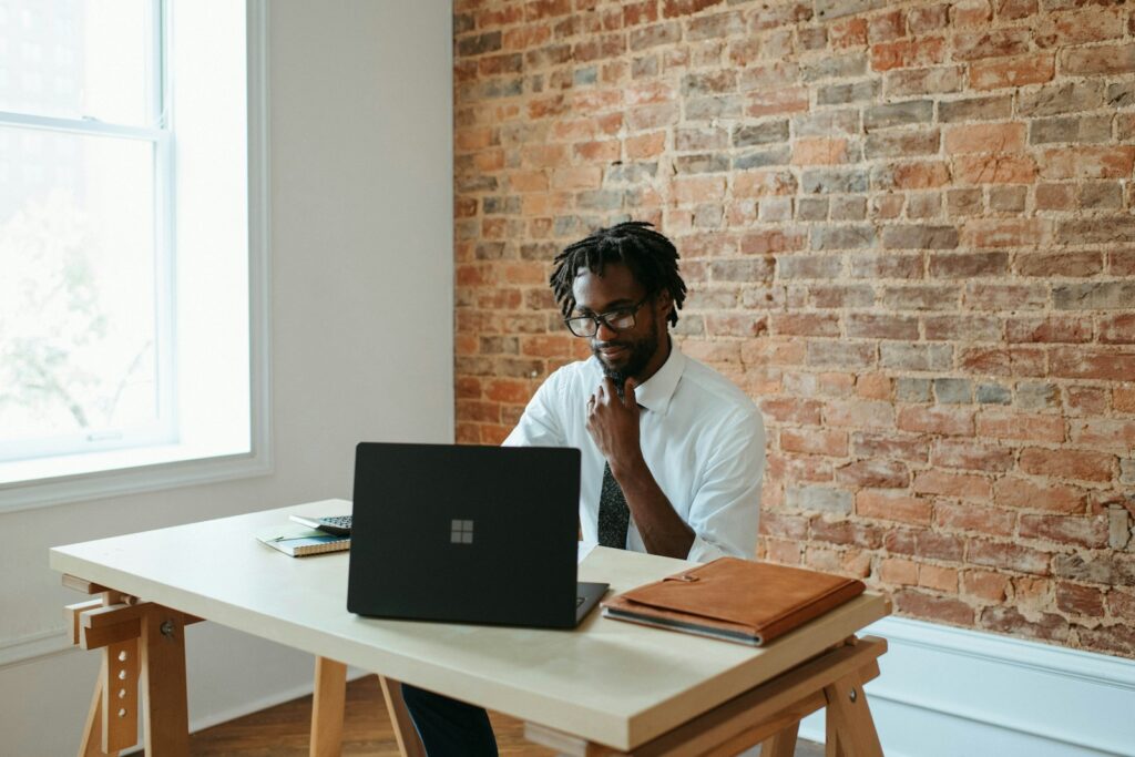 The Essential Dummies Guide to Starting Your Own Business 4 a man sitting at a table in front of a laptop