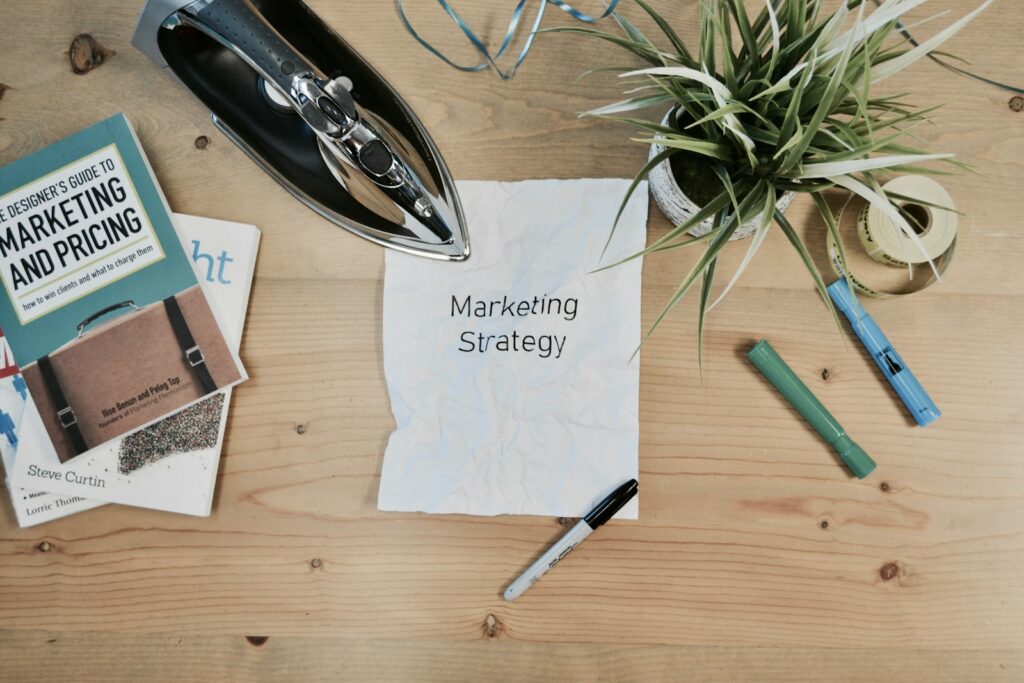 Choosing the Right Small Business Marketing Agency for Your Growth 1 white printing paper with Marketing Strategy text