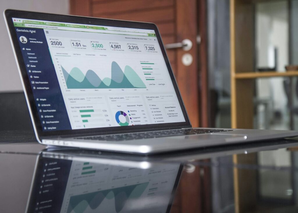 Search Engine Marketing Consultant: Everything You Need To Know 1 laptop computer on glass-top table