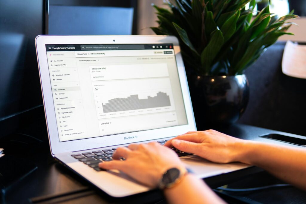 Search Engine Marketing Consultant: Everything You Need To Know 6 person using macbook air on brown wooden table