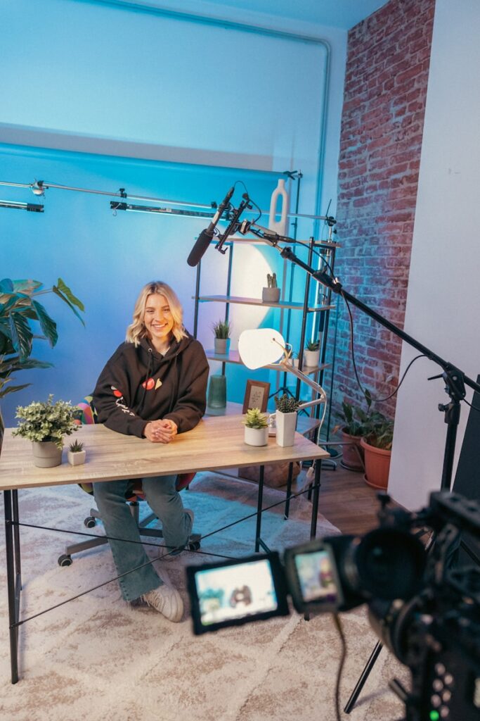 How to Become a Social Media Content Creator in 2025 1 a person sitting at a table