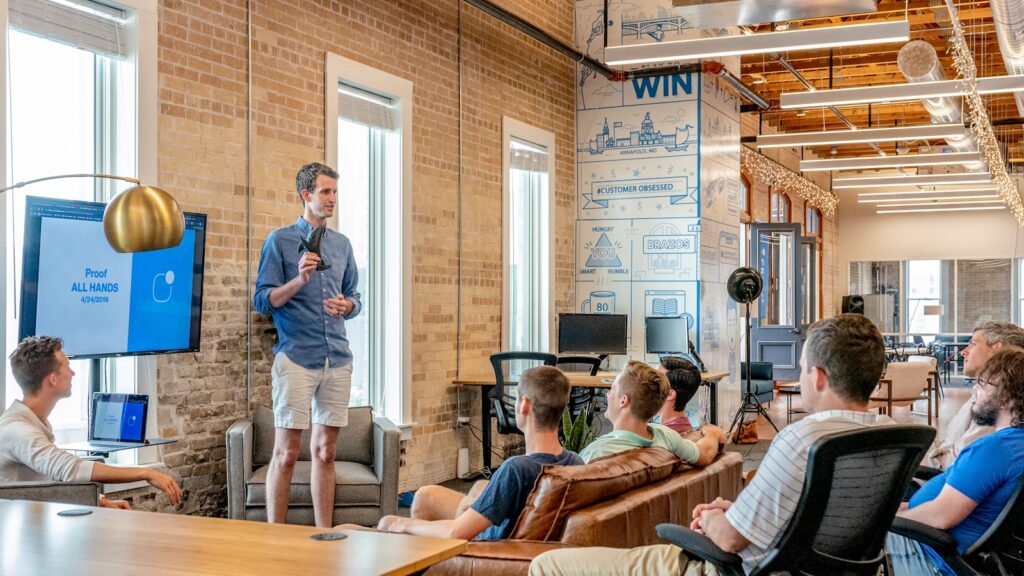 Social Media for Business: Your Complete Guide to Success 4 man standing in front of group of men