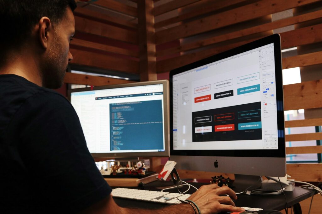Web Design and Development | Combining Form & Function for Results 2 man using Apple computer