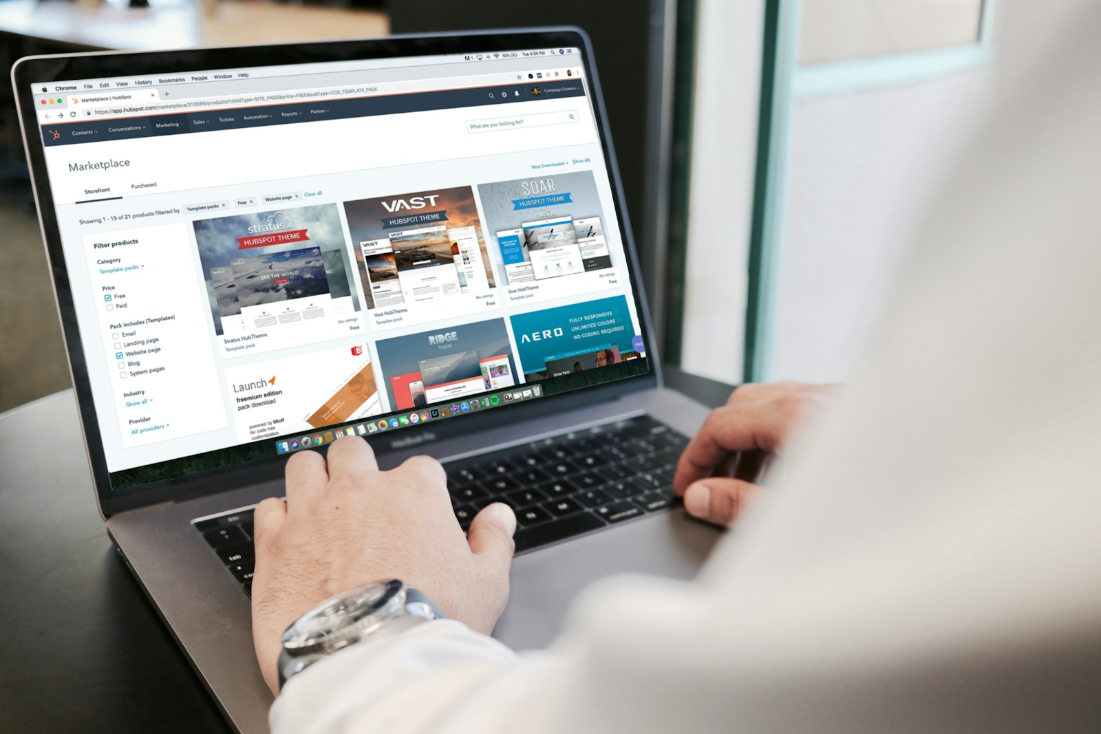 person using MacBook Pro (Web Design and Development) | Combining Form & Function for Results