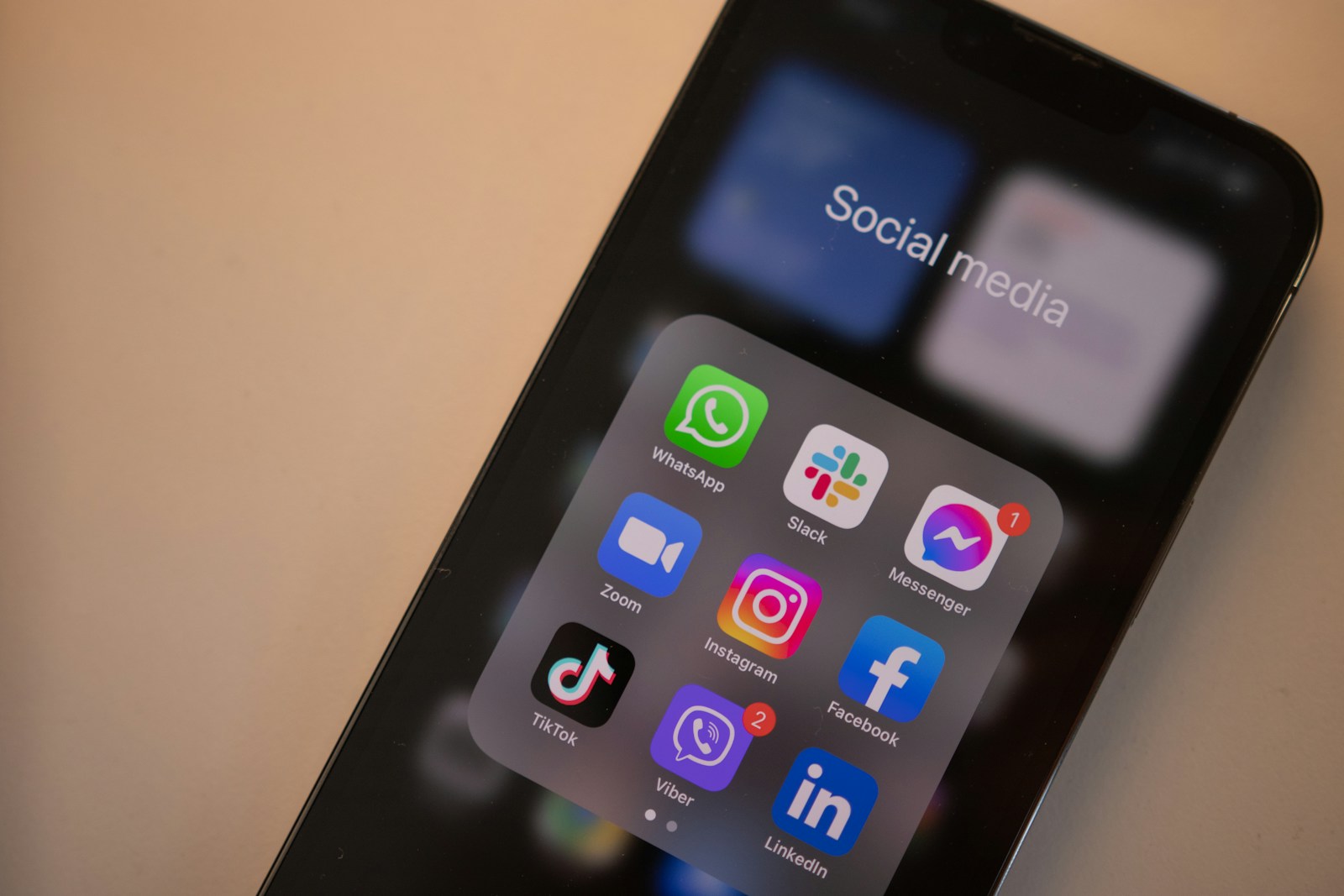 a black cell phone Social Media Strategist
