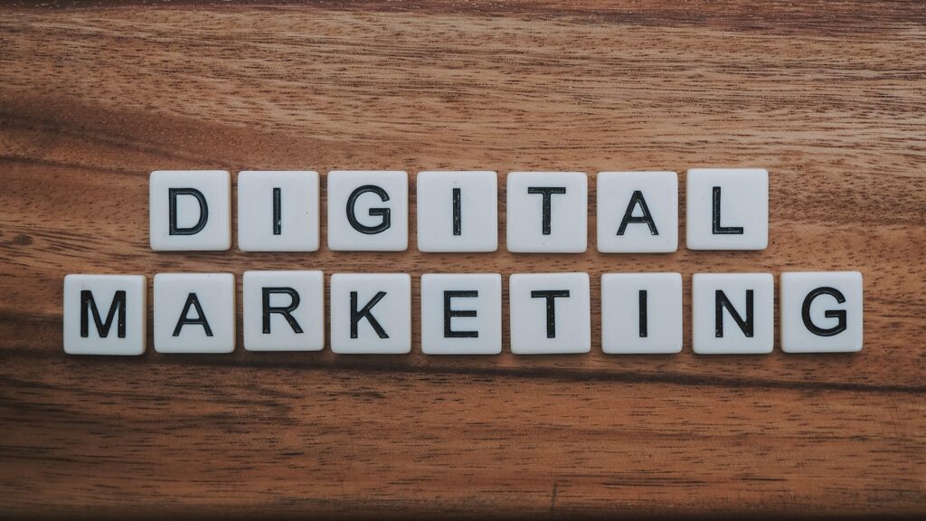 Digital and Social Media Marketing | Integrated Strategies for Success 1 digital marketing artwork on brown wooden surface
